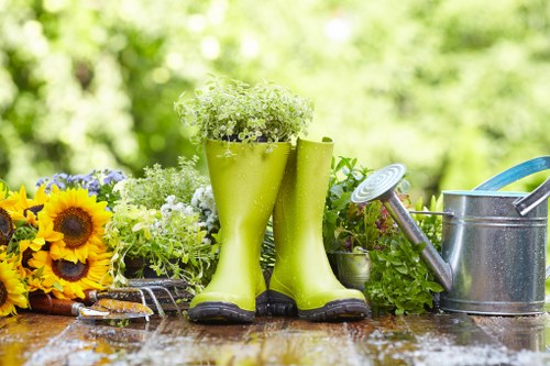 Insured landscaper reviewing safety checks and equipment on site